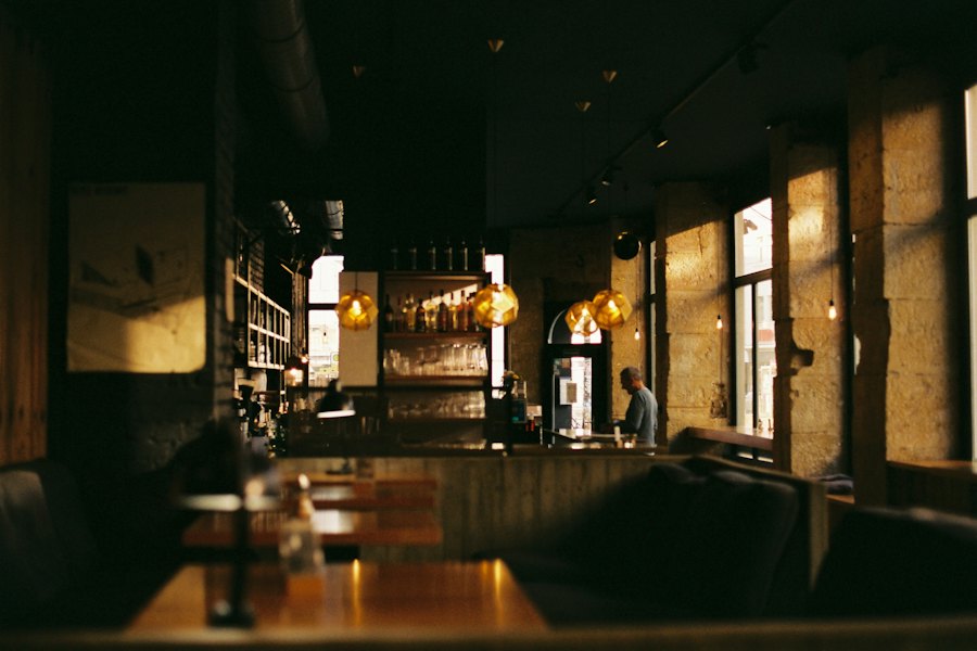 Restaurant dining room with warm pendant lighting